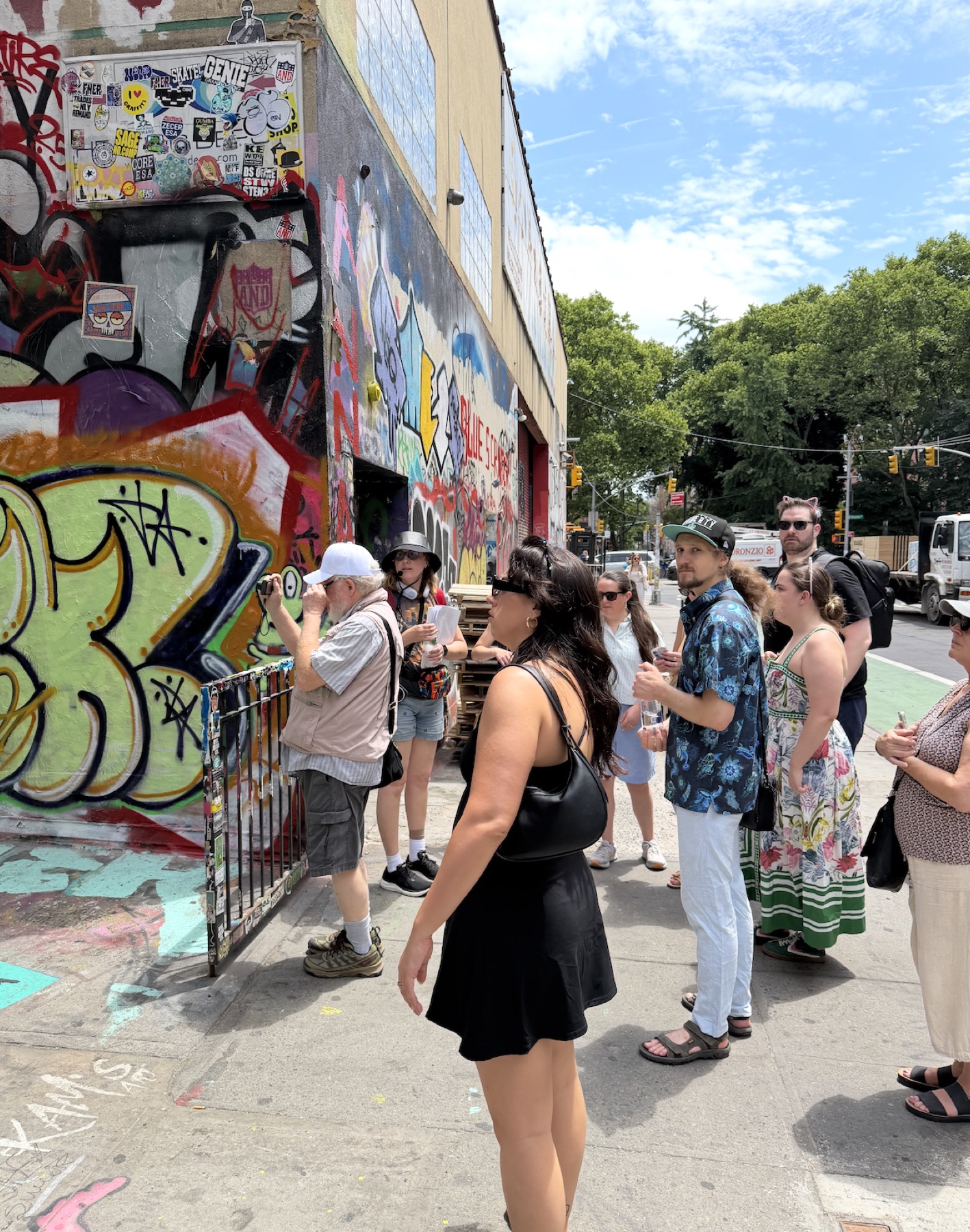 Lower East Side tour guests exploring Freeman Alley graffiti with Cats About Town Tours
